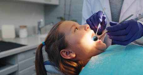 Hands, dental hygiene or girl in chair, tools or cavity with wellness, consultation or tooth decay....