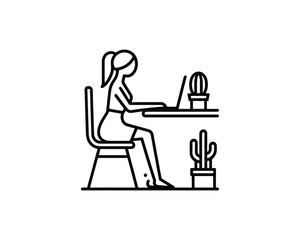 Woman working from home at desk with plants