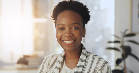 Happy, confident and portrait of black woman in office with creative career development. Smile,...