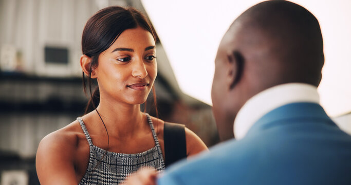 Getting ready, production and stylist in studio with model for photography session or shoot. Behind the scenes, preparation or styling with man and woman on set together for filming or videography