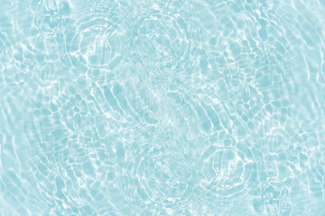 Blue water with ripples on the surface. Defocus blurred transparent blue colored clear calm water...