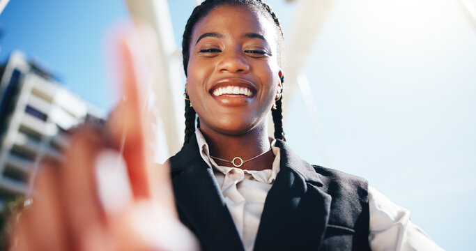 Business woman, smile and selfie in city with point, low angle and post on web with commute to work. African person, happy and portrait in town with social media, pride and profile picture in Nigeria