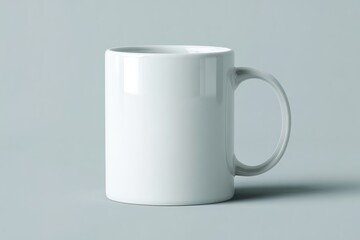 Simple white ceramic mug on a neutral gray background. Ideal for branding, coffee shop promotions, and product display mockups. High quality