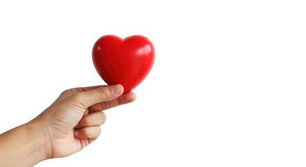 Obraz premium Hand holding a red heart against a transparent background in a studio setting