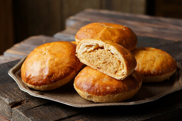 Close Up of Traditional Tau Sar Piah Chinese Pastry with Mung Bean Filling on Rustic Surface