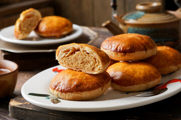 Close Up of Traditional Tau Sar Piah Chinese Pastry with Mung Bean Filling on Rustic Surface