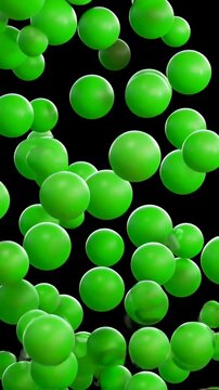 Vibrant green spheres in dynamic motion against black background.