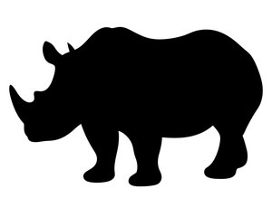 Silhouette of a strong rhinoceros standing with its characteristic horns clearly visible