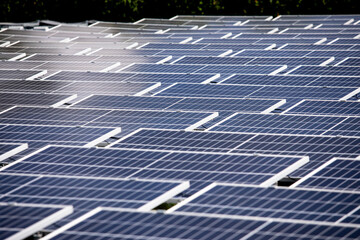 Selective focus to solar power station. Solar photovoltaic power station on water. Solar panels or...