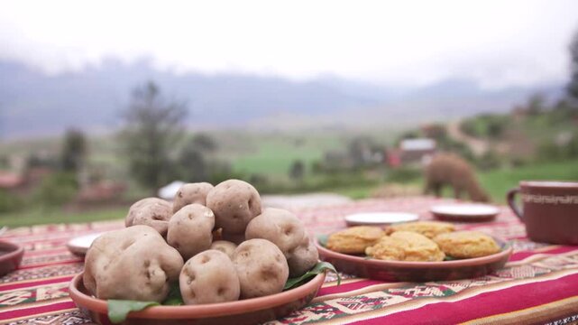 Potatoes and tortillas on a colorful tablecloth