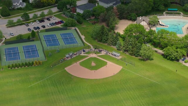 Baseball Players Playing During Match On A Sunny Day. Aerial shot 