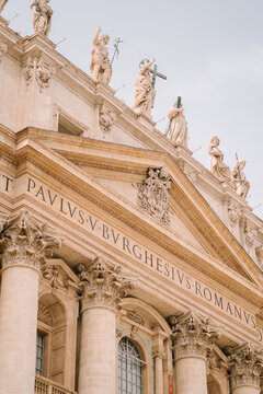 Detail of grand marble facade and statues at St. Peter&rsquo;s Basilica