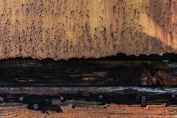 STEEL AND WOOD - Peeling paint and rust on iron
