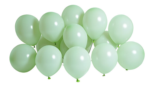 Pastel green balloons floating against a stark black backdrop conveying celebration