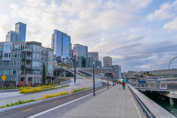 Seattle, USA, waterfront walk leading to the overlook walk, and the downtown skyline in the...