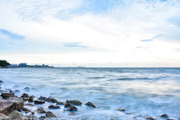 Sunset sky clouds in the Evening with Golden orange sunlight in golden hour, Dusk sky background.