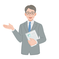 資料を持って説明をする中年のビジネスマン