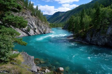 Fototapeta premium Majestic turquoise river flowing through green mountains in a tranquil valley landscape