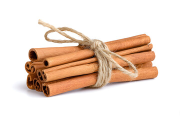 A bundle of cinnamon sticks tied with rustic twine, isolated on white. The natural, festive styling suits Christmas recipes, cozy ads, or rustic packaging.