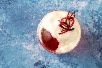 Elegant luxury cocktail in front of dark background