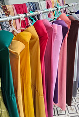 Bright Colorful Hijabs Displayed on Hangers