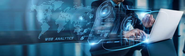 Businessman using laptop with analysis data of Digitization showing accelerated growth to impact on...