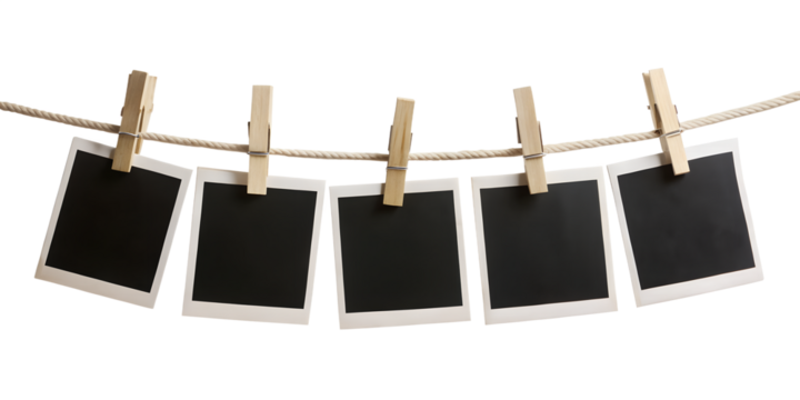 blank photo frames hanging on rope