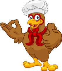 A chef chicken rooster cockerel cartoon character mascot doing a chefs okay perfect hand sign and thumbs up © Christos Georghiou