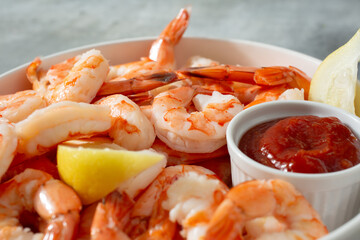 A closeup view of a shrimp cocktail plate.