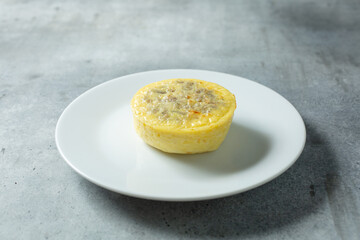 A view of an egg bite, on a plate.