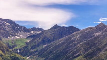 Obraz premium Dramatic Mountain Landscape with Deep Valleys and Ridge Lines – Aerial View