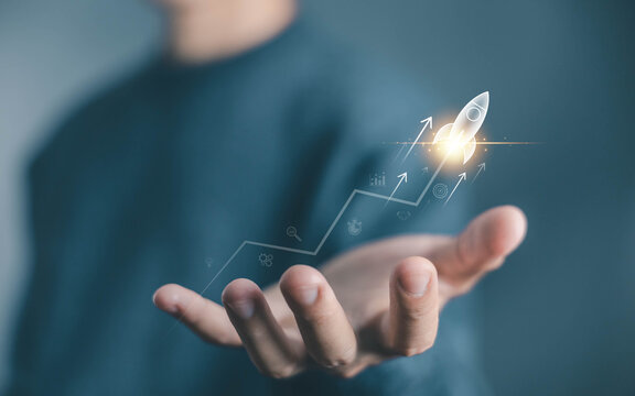businessman launch rocket, startup concept. entrepreneurship starts with digital technology and the growth of an online business. progress of Leadership and new business success - Powered by Adobe