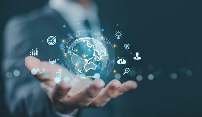 hand shows the globe of digital marketing. concept business tech international market. global...