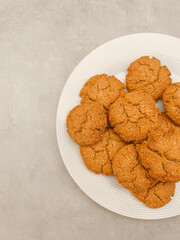 Delicious homemade oatmeal cookies on white plate