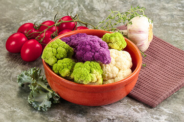 Raw cauliflower different colors heap