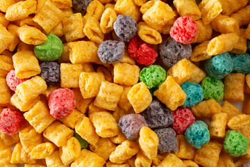 A top down view of a pile of popular crunchy cereal, as a background.