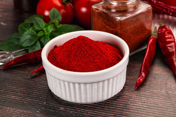 Spicy dry paprika powder in the bowl