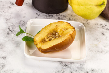 Baked quince with honey and cedar