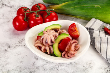 Salad with baby octopus and avocado
