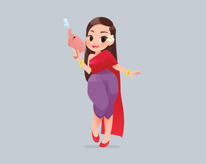 Smiling Thai woman in traditional dress celebrates Songkran with a water gun.