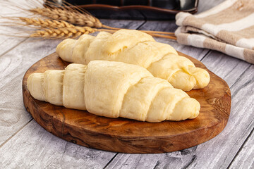 Raw uncooked croissant for bake