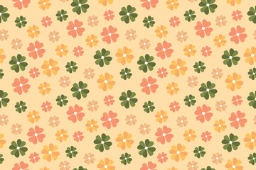 seamless pattern featuring abstract flowers in green, peach, and yellow on a light orange background
