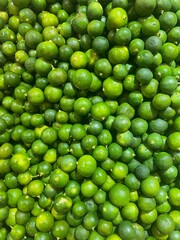 Close-up of a big lime in the basket at the market 