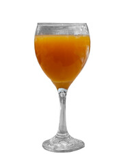Refreshing orange drink served in a clear glass with a stem on a white background