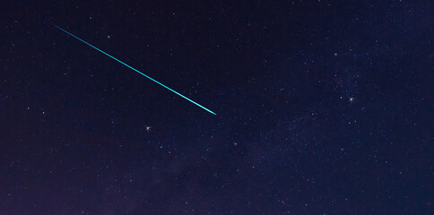 comet on blue night sky milky way and star on dark background.Universe filled with stars, nebula...