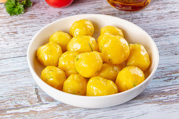 Boiled young potato with oil