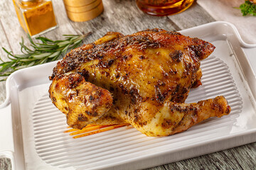 Baked in oven whole chicken with spices