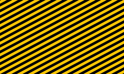 A view of a slanted black and yellow colored stripes, as a background.