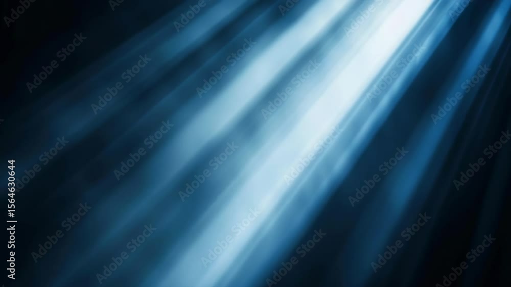 Poster a blue light shining on a dark background. the light is coming from the top and is creating a sense 