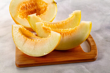 Ripe sweet juicy melon with slices